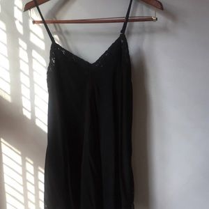 Black slip dress with lace detailing